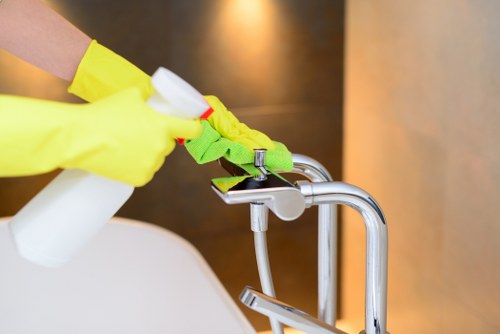 Professional carpet cleaning treatment being applied to a carpeted floor
