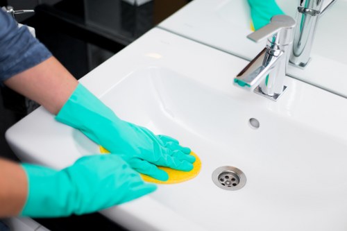 Local cleaner preparing a tidy flat in Merton for a routine visit